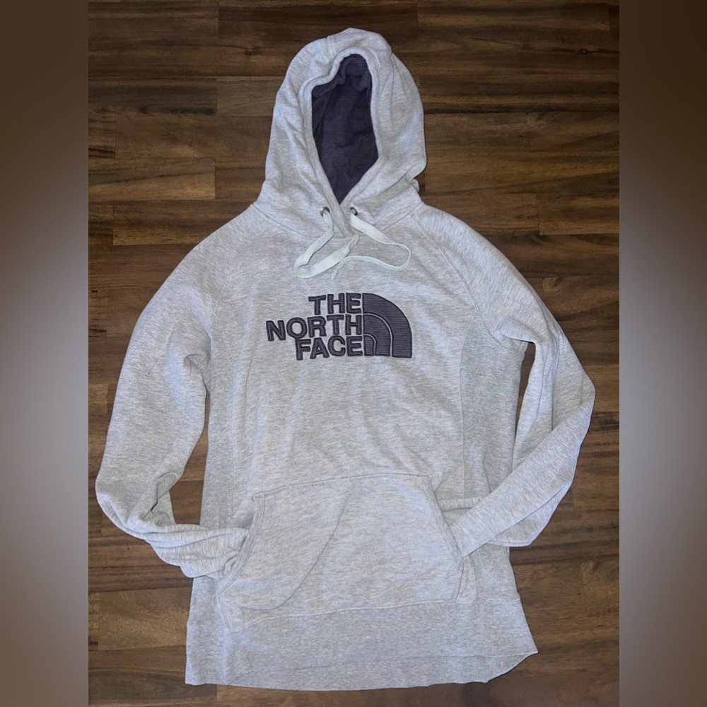 grey and purple north face hoodie